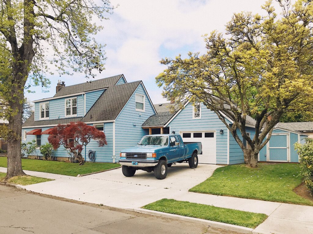blue California house with blue truck 